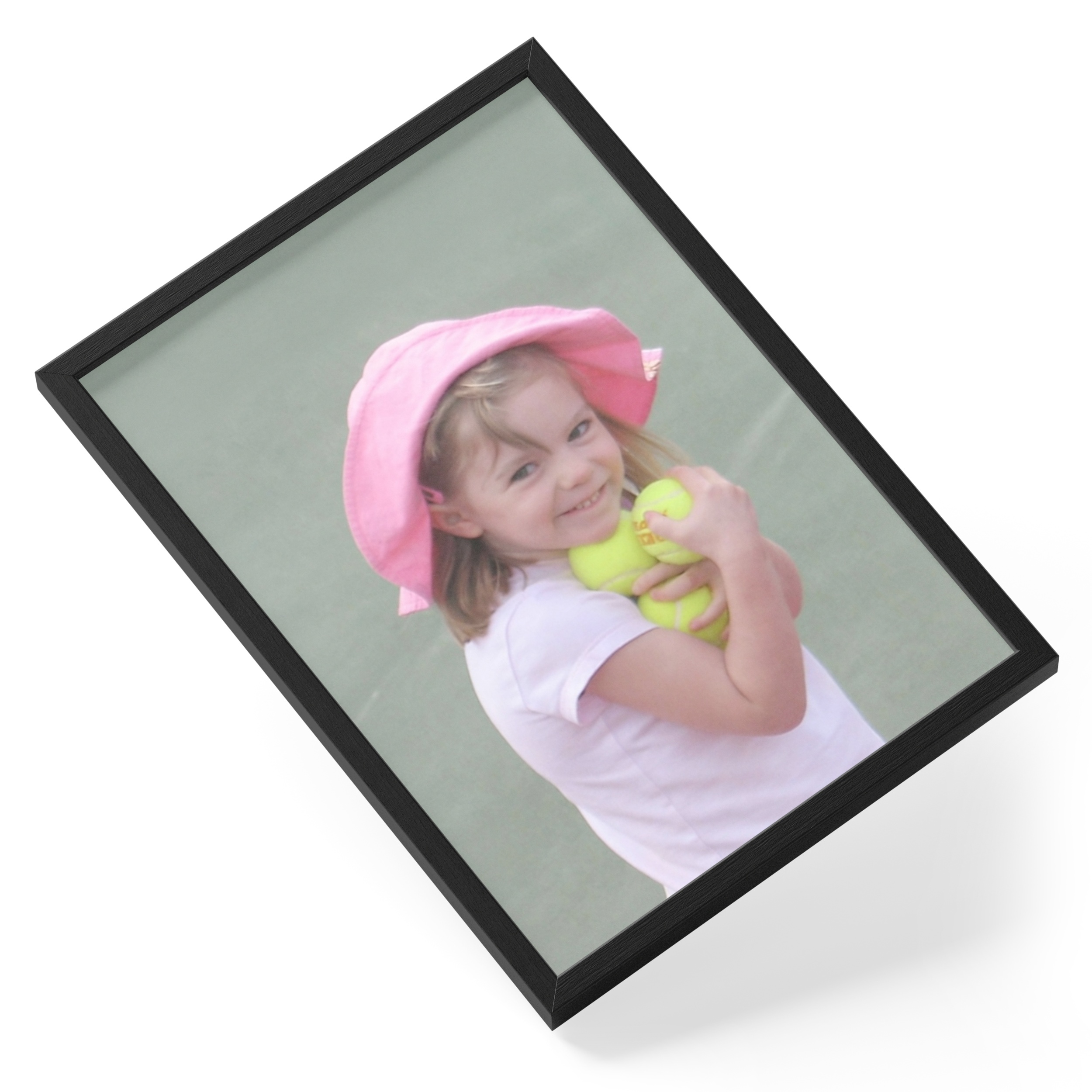 Madeleine Mccann Missing Child Portugal Portrait Photo — angled view